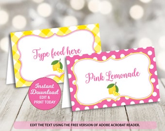 May include: Two printable food labels with a yellow and white checkered pattern and pink polka dot pattern. The text on the labels reads "Type food here" and "Pink Lemonade". Both labels feature a lemon graphic.