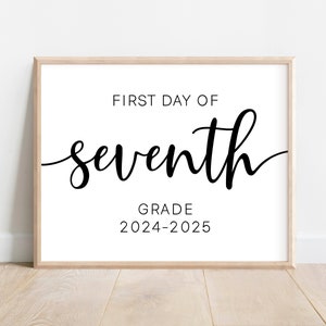 May include: A white printable sign with black text that reads "First Day of Seventh Grade 2024-2025".