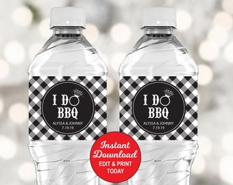 May include: Two clear plastic water bottles with black and white checkered labels that say "I Do BBQ" with a diamond ring icon. The labels also include the text "Alyssa & Johnny 7.19.19".