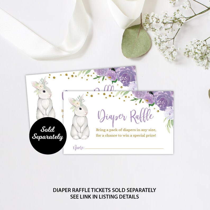 May include: Purple and white floral diaper raffle tickets with a cute bunny illustration. The text reads "Diaper Raffle" and "Bring a pack of diapers in any size, for a chance to win a special prize!"