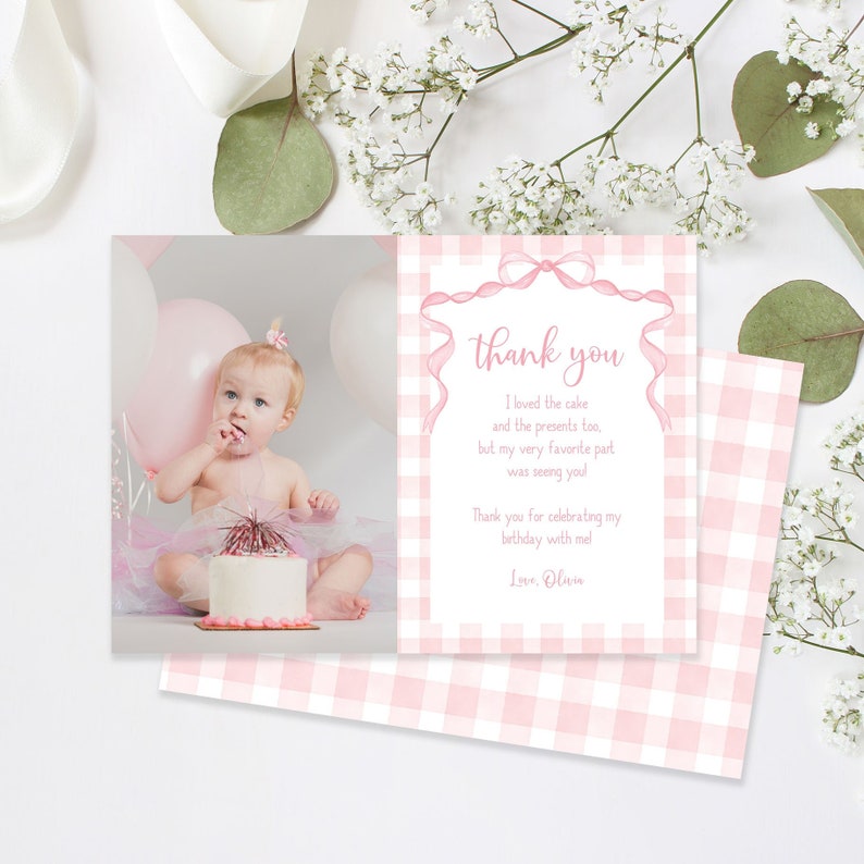 Pink and white gingham pattern border with a cute watercolor pink bow at the top. White text box in the middle contains fully editable text. Photo of child is on the left side. Optional backside has matching pink and white gingham pattern on it.