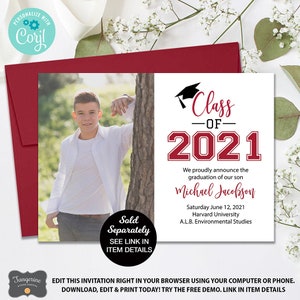 May include: A graduation announcement with a photo of a young person leaning against a tree. The announcement features the text "Class of 2021" in red and black, along with the graduate's name, date, and university. A red envelope is visible.