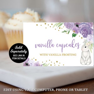 May include: Printable sign for a dessert table with a purple floral design and a white bunny. The sign reads "vanilla cupcakes with vanilla frosting".