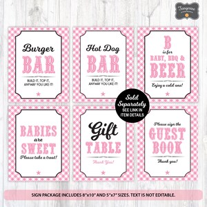 May include: Six pink and white gingham printable signs for a baby shower. The signs read "Burger Bar", "Hot Dog Bar", "B is for Baby, BBQ & Beer", "Babies are Sweet", "Gift Table", and "Please sign the Guest Book".