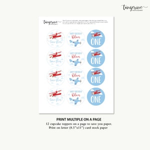 May include: Twelve printable cupcake toppers featuring a red and blue airplane design. The toppers say "Happy Birthday Oliver" and "Time Flies" with a blue background and "One" with a light blue background.