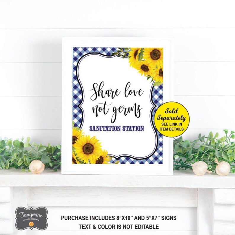 May include: A white sign with a blue and white gingham pattern and sunflowers. The sign says "Share love not germs" and "Sanitation Station". The sign is sold separately and includes an 8x10 inch and 5x7 inch sign.
