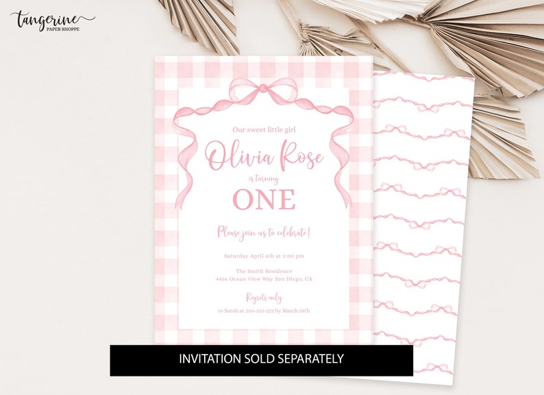 May include: Pink and white gingham patterned invitation with a pink ribbon bow and the text "Our sweet little girl Olivia Rose is turning ONE. Please join us to celebrate! Saturday April 8th at 2:00 pm The Smith Residence 6555 Ocean View Way San Diego, CA.  RSVP only to [email protected] by March 15th.  INVITATION SOLD SEPARATELY"