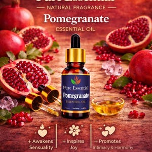 May include: An advertisement for Pure Essential Pomegranate Essential Oil. The image features a bottle of oil, a small bowl of oil, and several pomegranates. Text includes "Pure Essential", "Natural Fragrance", and "Essential Oil".