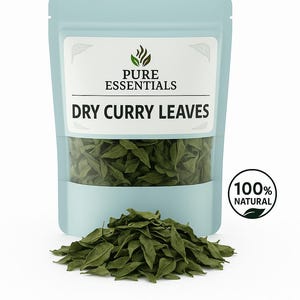 May include: A light blue pouch of dry curry leaves with the text "Pure Essentials" and "Dry Curry Leaves". A pile of green leaves sits in front of the pouch. A circular sticker reads "100% Natural".