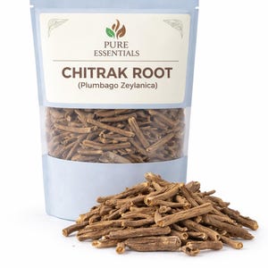 May include: A light blue pouch with the text "PURE ESSENTIALS" and "CHITRAK ROOT (Plumbago Zeylanica)" contains dried brown roots. A pile of the same roots sits in front of the pouch.
