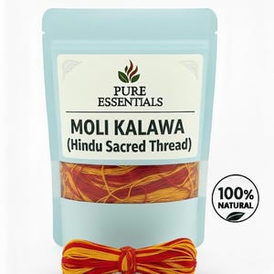 May include: A light blue pouch labeled "Pure Essentials" containing red and yellow Moli Kalawa (Hindu Sacred Thread). A tied bundle of the thread sits below the pouch. The text "100% Natural" is in a circle on the right.