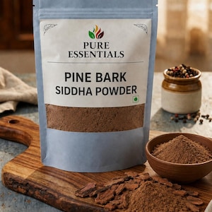 May include: A light blue stand-up pouch labeled Pure Essentials Pine Bark Siddha Powder containing brown powder. The pouch sits on a wooden board with loose pine bark pieces and a small wooden bowl filled with the same brown powder.