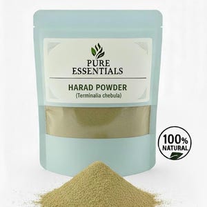 May include: A light blue pouch of Harad Powder (Terminalia chebula) with a white label and the words "Pure Essentials". A pile of green-brown powder sits in front of the pouch. The words "100% Natural" are in a circle.