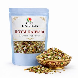 May include: A light blue pouch of "Royal Rajwadi Mouth Freshener" with a clear window, next to a decorative bowl filled with the same mix. The pouch has the "Pure Essentials" logo and text.