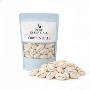 May include: A package of cowrie shells with the text "PURE ESSENTIALS COWRIES SHELL". The shells are off-white and oval-shaped, with a slit on the underside. A pile of shells is in front of the package.