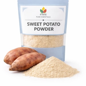 May include: A light blue pouch of sweet potato powder with the text "SWEET POTATO POWDER". Two sweet potatoes and a pile of powder are in front of the pouch. The brand name "PARIE PURE ESSENTIALS" is at the top.
