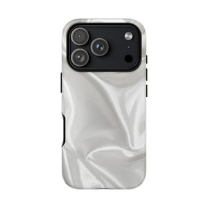 May include: A white phone case with a pearlescent, rippled design. The case has a black camera module with three lenses and a flash. The case has black accents on the sides.