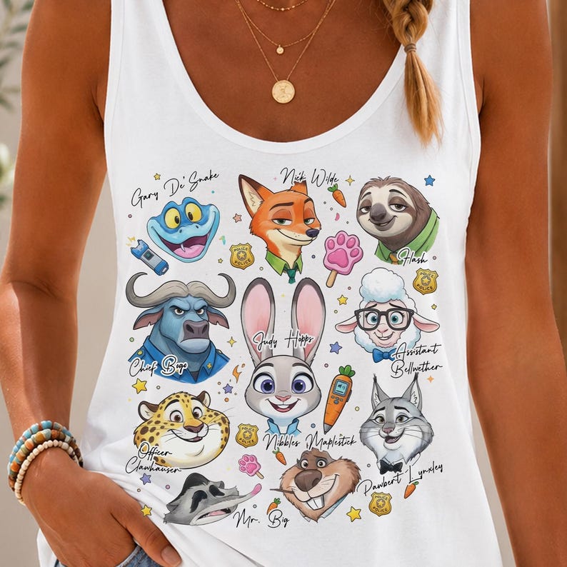 a woman wearing a white tank top with cartoon characters on it