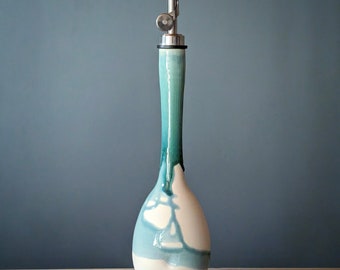 Soft blue over white porcelain olive oil bottle