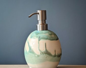 Green glaze over natural cream colored clay liquid soap dispenser