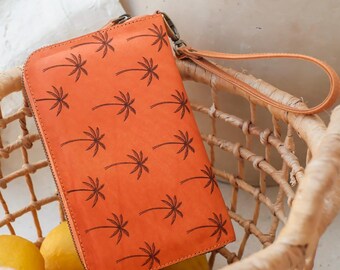Cartera con estampado de palmeras
