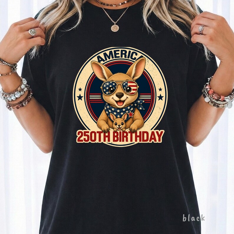 Cute patriotic kangaroo wearing American flag sunglasses shirt, America 250 shirt, funny animal tee, patriotic shirt, retro USA shirt, 4th of July shirt, vintage Americana animal graphic tee, USA 250 anniversary apparel, independence day shirt, animal graphic tee, summer patriotic outfit, funny patriotic animal shirt, freedom celebration shirt, fourth of july tee, cute kangaroo lover gift.
