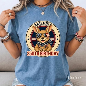Cute patriotic kangaroo wearing American flag sunglasses shirt, America 250 shirt, funny animal tee, patriotic shirt, retro USA shirt, 4th of July shirt, vintage Americana animal graphic tee, USA 250 anniversary apparel, independence day shirt, animal graphic tee, summer patriotic outfit, funny patriotic animal shirt, freedom celebration shirt, fourth of july tee, cute kangaroo lover gift.