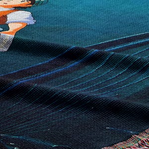 a close-up view of a textured fabric with a colorful, abstract design.