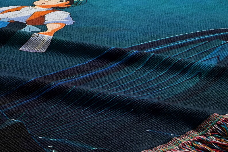 a close-up view of a textured fabric with a colorful, abstract design.
