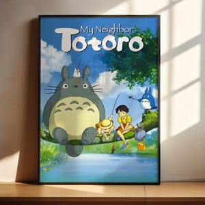 The image is a poster for the animated film "My Neighbor Totoro". It features the characters Totoro, a gray cat, and his friends in a forest setting.