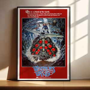 The image is a poster for the movie "Warriors of the Wind", featuring a large, colorful illustration of a dragon-like creature surrounded by red and blue elements.