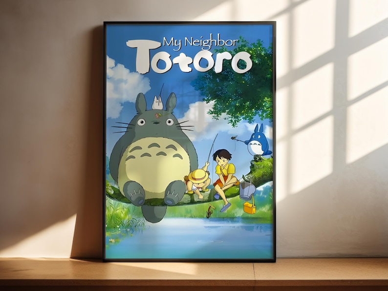 The image is a poster for the animated film "My Neighbor Totoro". It features the characters Totoro, a gray cat, and his friends in a forest setting.