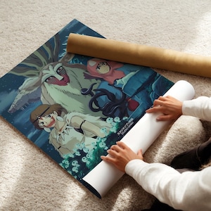 A person is holding a rolled-up poster with an illustration of characters from an anime or manga series.