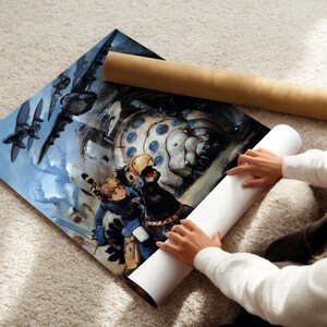 A person is holding a roll of paper and a poster featuring an illustration of a character and a large, abstract structure.
