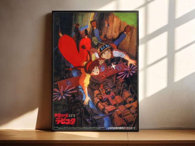 The image is a framed poster featuring an animated scene with two characters, one wearing a red outfit and the other in a blue outfit, surrounded by various elements such as buildings, flowers, and a helicopter.