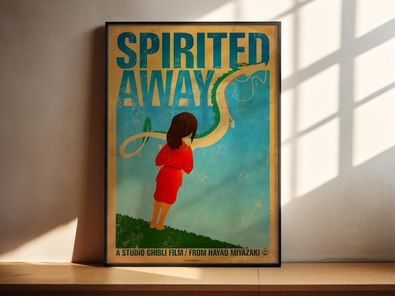 The image is a poster for the Studio Ghibli film " Spirited Away". It features an illustration of a young girl in a red dress standing on a grassy hill, with a large dragon-like creature in the background.