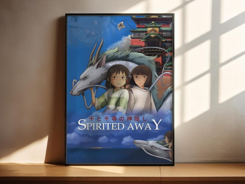 The image is a poster for the animated film " Spirited Away". It features two young girls, one with a dragon-like creature, standing in front of a castle-like structure. The poster has a blue background with a cloudy sky and water in the background. The title "Spirited Away" is prominently displayed in the center of the poster.