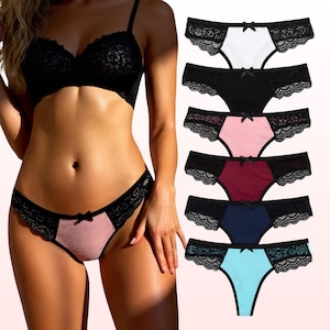 May include: A set of six pairs of underwear featuring black lace side panels and a small centre bow. The collection includes solid colours in white, black, pink, burgundy, navy blue, and light blue, each with a matching black lace trim.