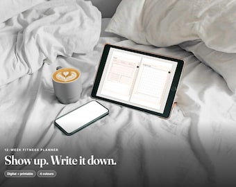 May include: A tablet displaying a 12-week fitness planner, a smartphone with a blank white screen, and a grey mug filled with latte art. The text on the image reads: 12-WEEK FITNESS PLANNER, Show up. Write it down., Digital + printable, 4 colours.