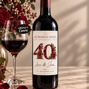 May include: A wine bottle with a cream-colored label featuring the text ZUR RUBINHOCHZEIT, LIEBE BESTÄNDIGKEIT TREUE, the number 40 decorated with red roses and ruby-like gems, the names Laura & Jonas, and the date 26. OKTOBER 2026.
