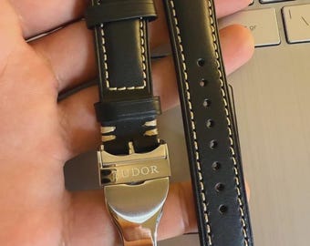 Correa de reloj Tudor de 22 mm de piel negra con hebilla desplegable plateada, auténtica y maciza.