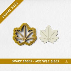 May include: A maple leaf cookie cutter and a leaf-shaped cutout are displayed against a white background. The cookie cutter is gold, and the cutout is off-white. Text in the image reads "DIGITAL FILES" and "SHARP EDGES • MULTIPLE SIZES."