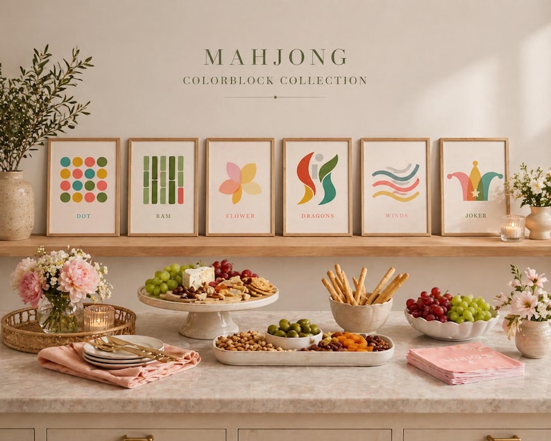 May include: Six framed art prints from the "Mahjong Colorblock Collection" are displayed on a shelf. Each print features a unique abstract design in various colors. The prints are labeled "Dot", "Ram", "Flower", "Dragons", "Winds", and "Joker".