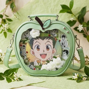 Mochila Apple Ita Bag, 30 cm, bolsa transparente para exhibición de pines en piel sintética.
