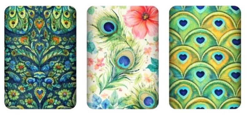 May include: Three rectangular designs with floral and peacock feather patterns. The first features a dark blue floral design with green and orange accents. The second has peacock feathers and a pink flower on a white background. The third has a pattern of peacock feathers.