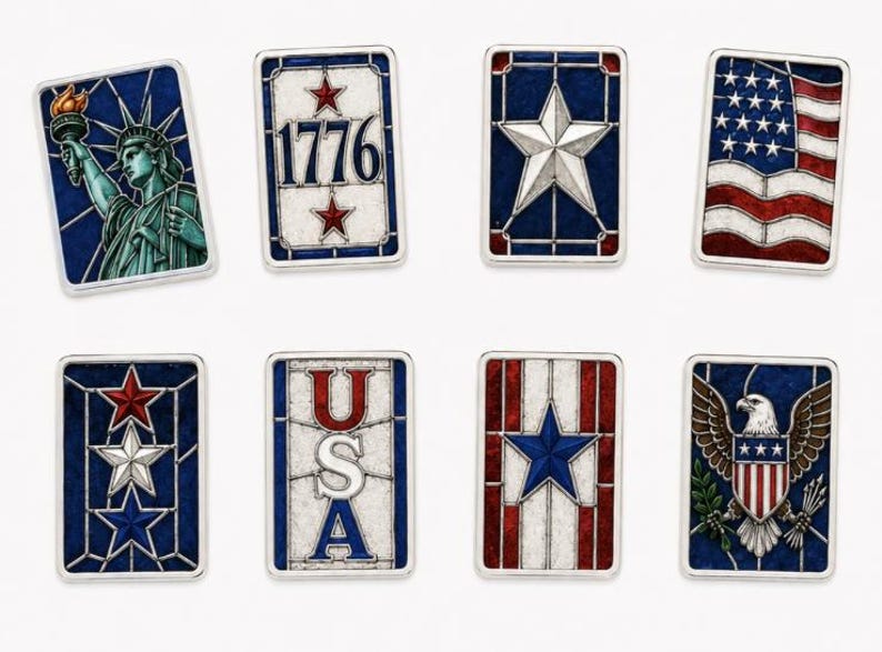 May include: A set of rectangular metal pins with patriotic designs. The pins feature the Statue of Liberty, the number 1776, a white star on a blue background, and the American flag. Other pins display the word "USA" and an eagle.