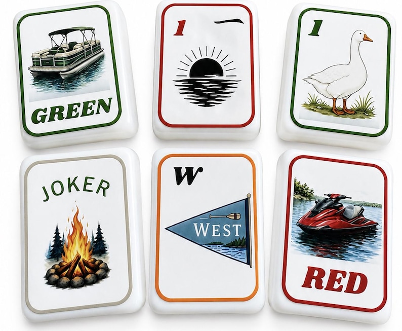 May include: Six white ceramic tiles with colorful illustrations and text. The tiles feature images of a boat, a sunset, a goose, a campfire, a nautical flag, and a jet ski. The text includes "GREEN", "1", "JOKER", "W WEST", and "RED".