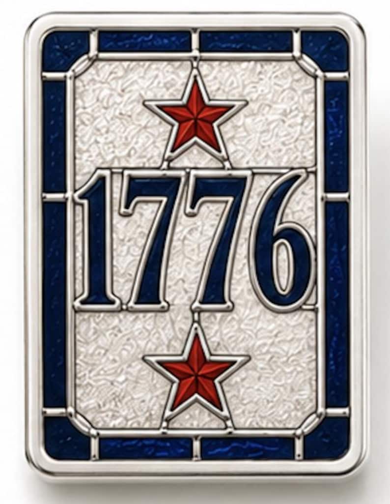 May include: Rectangular plaque with a silver frame, featuring the year "1776" in blue, with red stars above and below. The background has a textured, silver-white pattern, and the border is a deep blue.