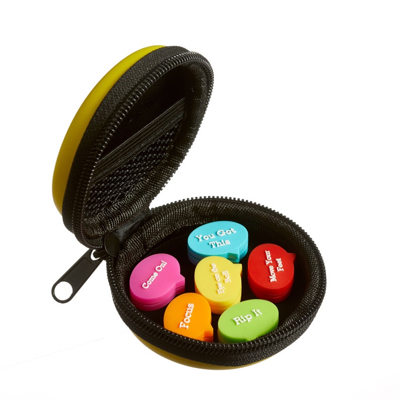May include: A yellow zippered case with six colorful motivational message speech bubbles inside. The messages are "Come On!", "Focus", "You Got This", "Bye on the Ball", "Rip It", and "Move Your Feet".
