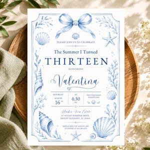 Peut inclure: Une carte d'invitation blanche ornée d'illustrations aquarelles bleues de coquillages, d'étoiles de mer et d'un nœud. Le texte indique : The Summer I Turned THIRTEEN honoring Valentina, Saturday August 16th at 4:30 PM, Two Thousand Twenty Five, Harbor View Estate.